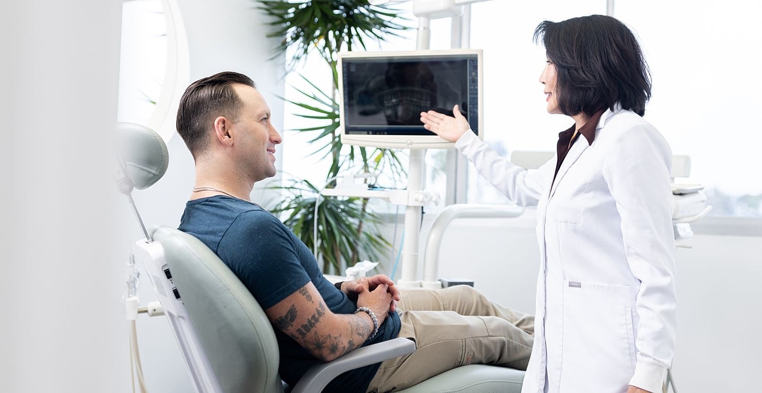 marina del rey dentist Dr. Rosita Tan showing x-ray to a patient